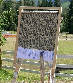 home built rug-making loom on easel
